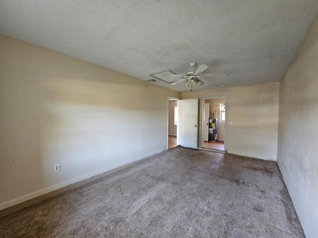 3261 Southwest 22nd Street Okeechobee, FL 34974 - Photo 6 of 15 an empty room with a empty space and windows