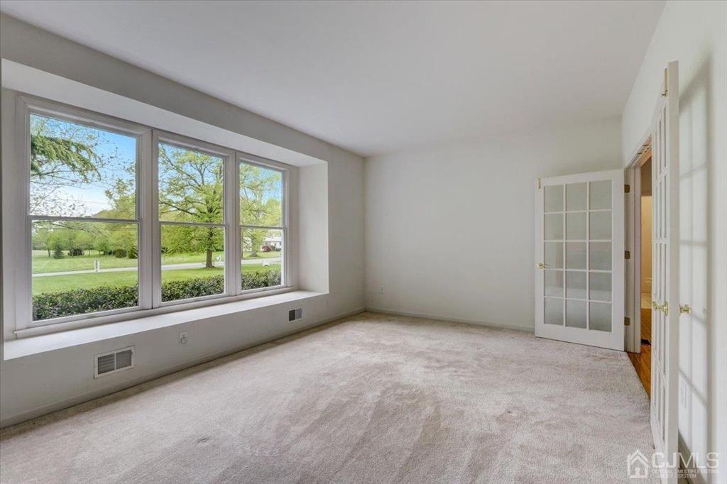100 North Main Street Cranbury, NJ 08512 - Photo 12 of 74 a view of an empty room with a window