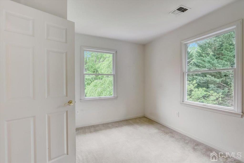 100 North Main Street Cranbury, NJ 08512 - Photo 29 of 74 a view of an empty room with a window