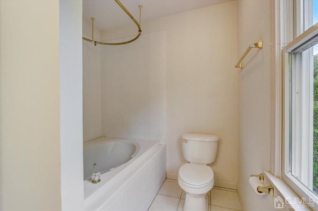 100 North Main Street Cranbury, NJ 08512 - Photo 32 of 74 a bathroom with a toilet and a shower
