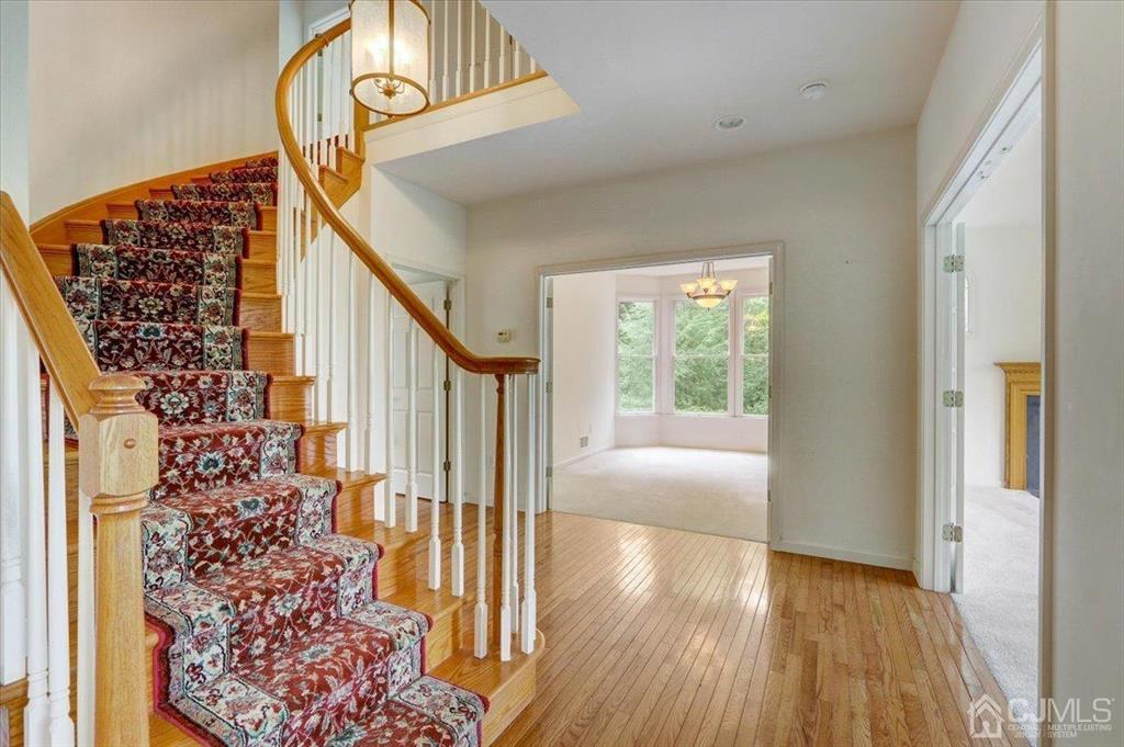 100 North Main Street Cranbury, NJ 08512 - Photo 4 of 74 a view of entryway with wooden floor