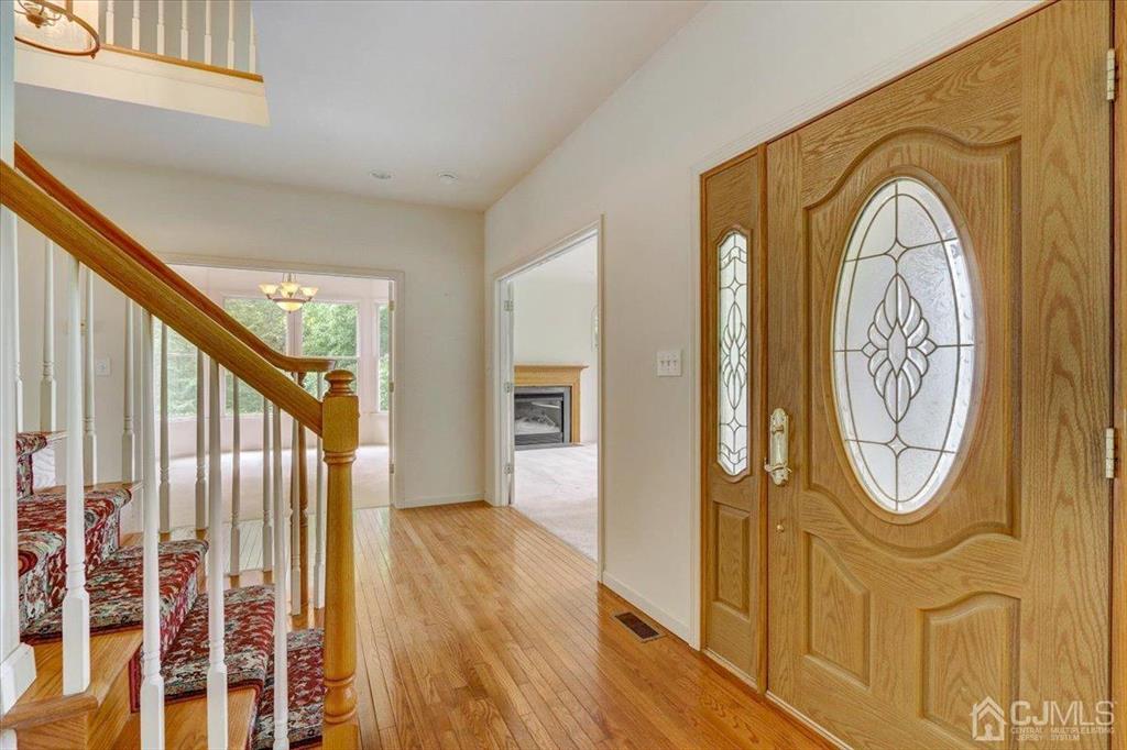 100 North Main Street Cranbury, NJ 08512 - Photo 5 of 74 a view of a entryway door with wooden floor