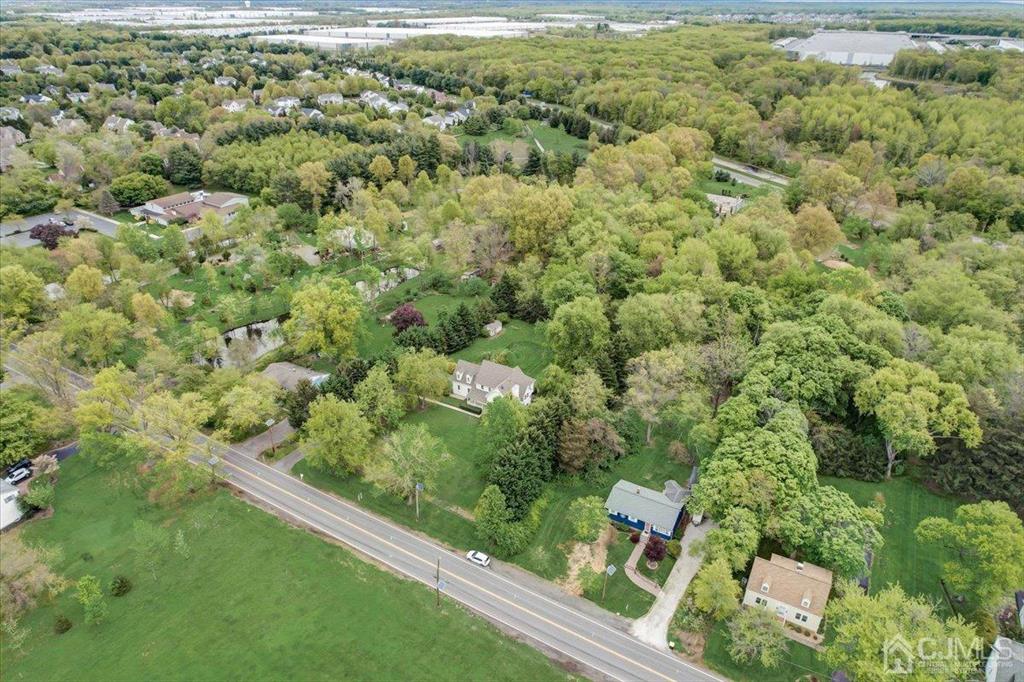 100 North Main Street Cranbury, NJ 08512 - Photo 55 of 74 an aerial view of residential houses with outdoor space and trees