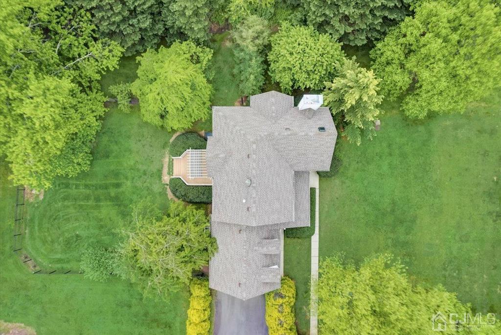 100 North Main Street Cranbury, NJ 08512 - Photo 67 of 74 an aerial view of a house with a yard and tree s