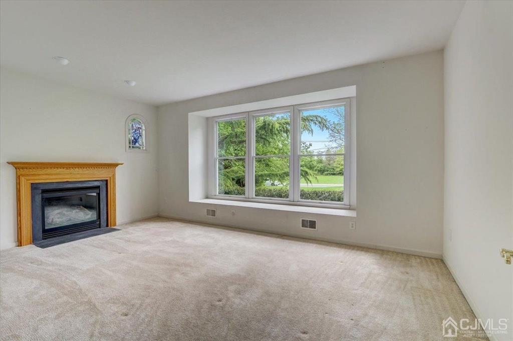 100 North Main Street Cranbury, NJ 08512 - Photo 10 of 74 a view of empty room with a fireplace