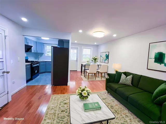 $1,090,000 | 42-32 196th Street | Auburndale