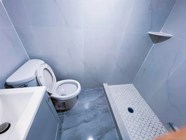 $1,090,000 | 42-32 196th Street | Auburndale