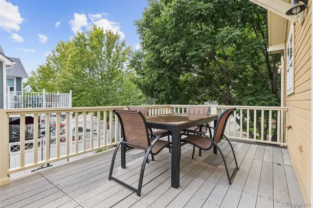 a view of a deck patio and outdoor seating