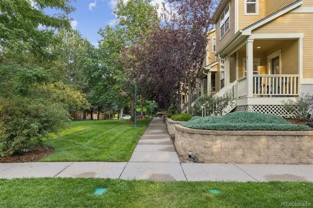 a front view of a house having yard