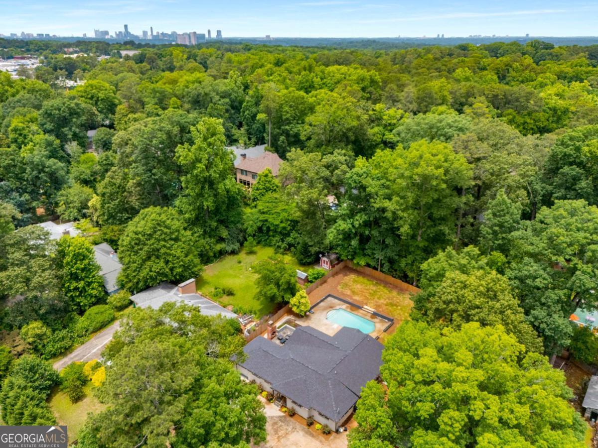 3154 North Druid Hills Road Decatur, GA 30033 - Photo 20 of 84 an aerial view of residential house with outdoor space and swimming pool