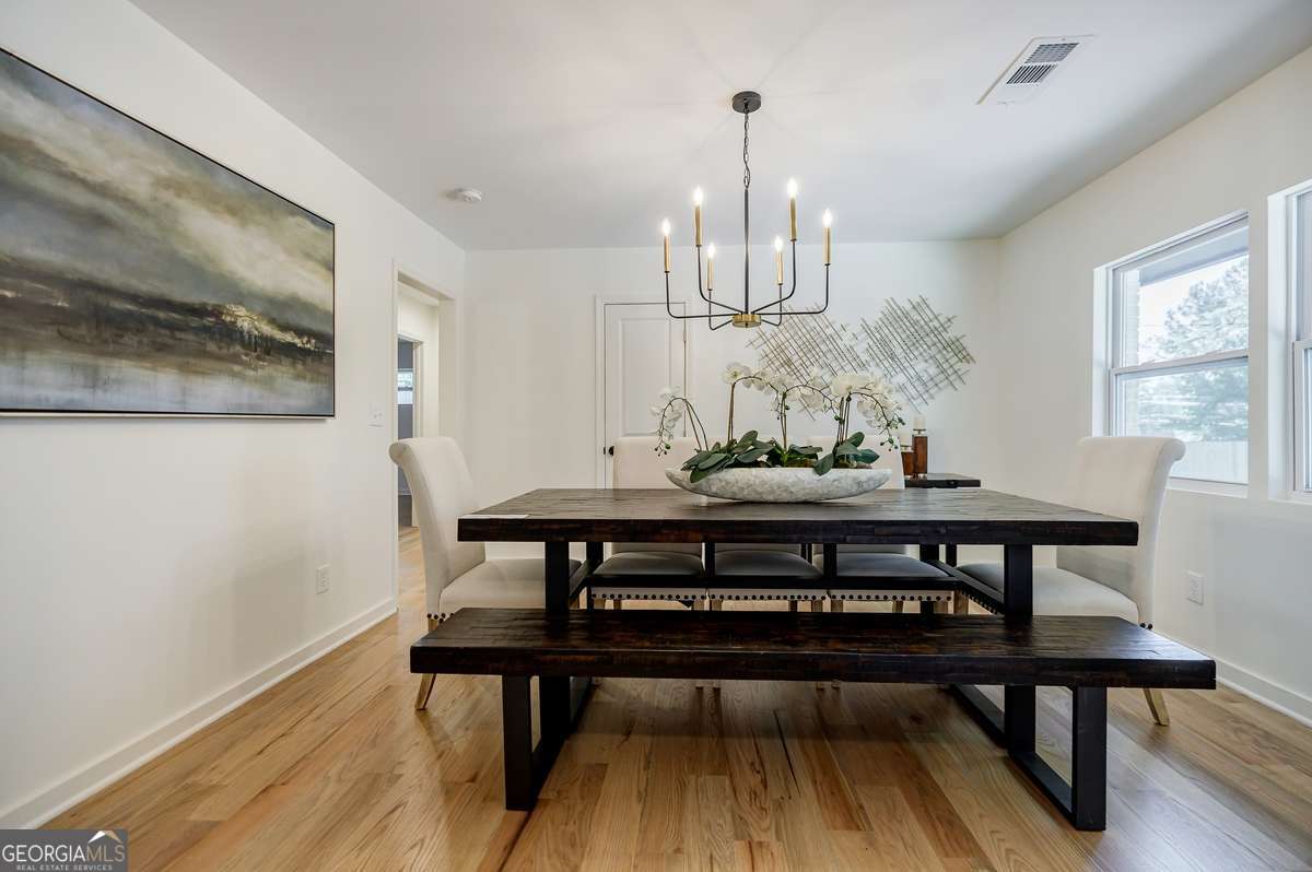 3154 North Druid Hills Road Decatur, GA 30033 - Photo 27 of 84 a view of a dining room with furniture window and wooden floor
