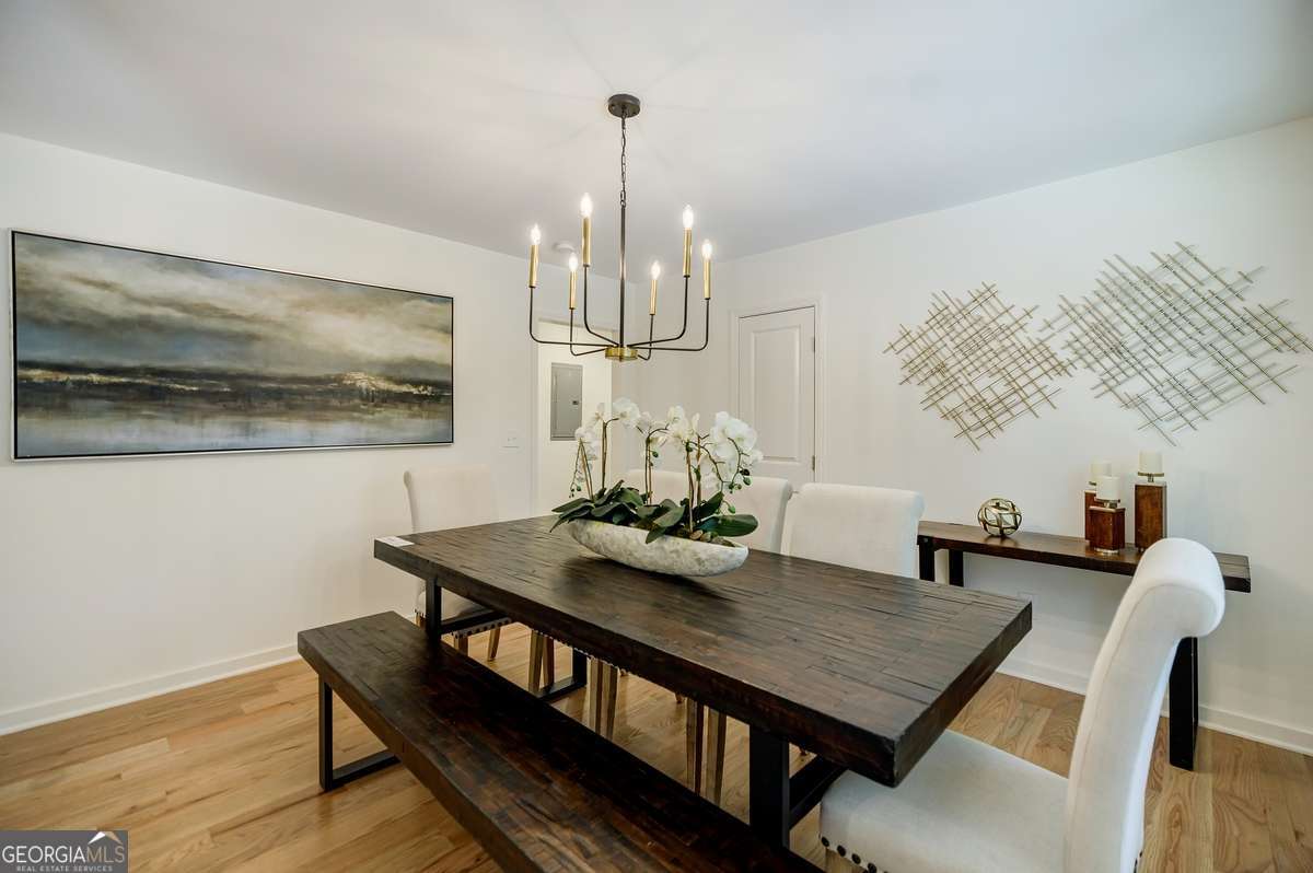 3154 North Druid Hills Road Decatur, GA 30033 - Photo 30 of 84 a view of a dining room with furniture and wooden floor