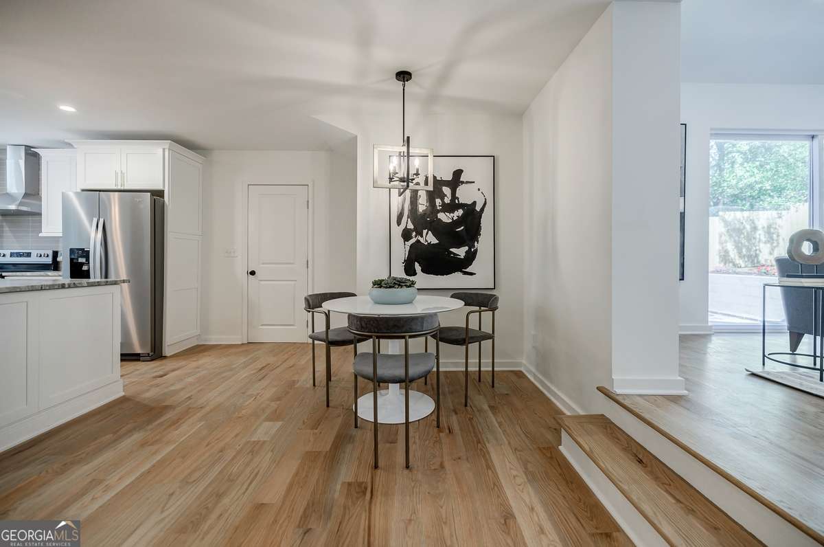 3154 North Druid Hills Road Decatur, GA 30033 - Photo 37 of 84 a view of a dining room with furniture window and wooden floor