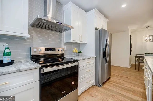 a bedroom with a bed and furniture