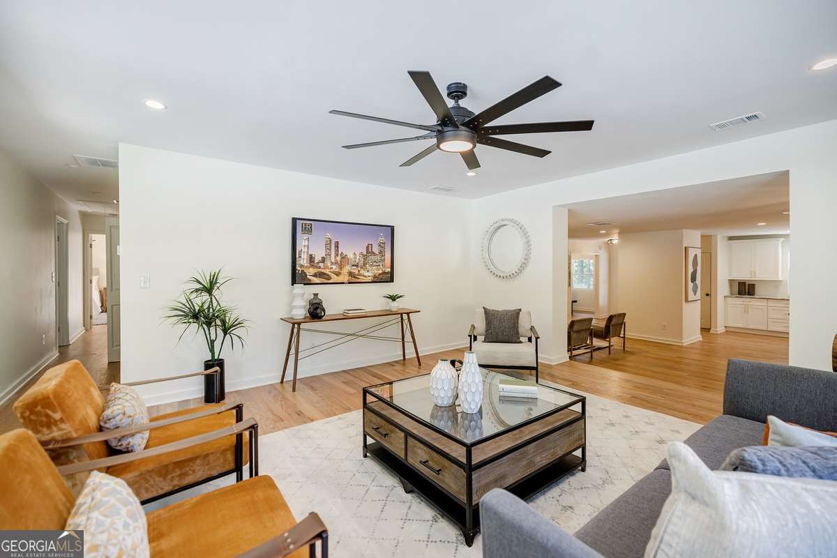 3154 North Druid Hills Road Decatur, GA 30033 - Photo 47 of 84 a living room with furniture and a large window