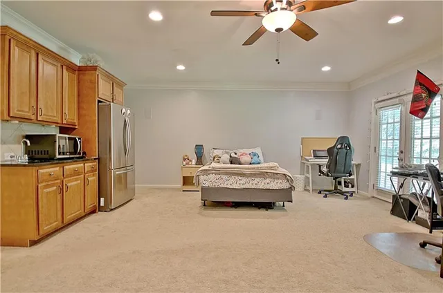 a view of a bench in the backyard of a house