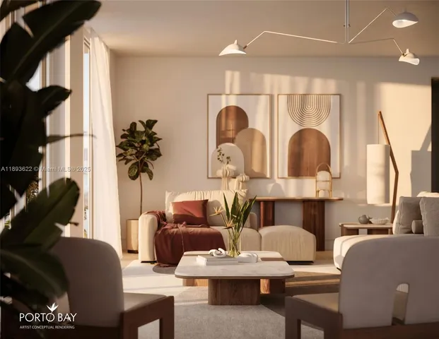 a living room with furniture fireplace and a large window