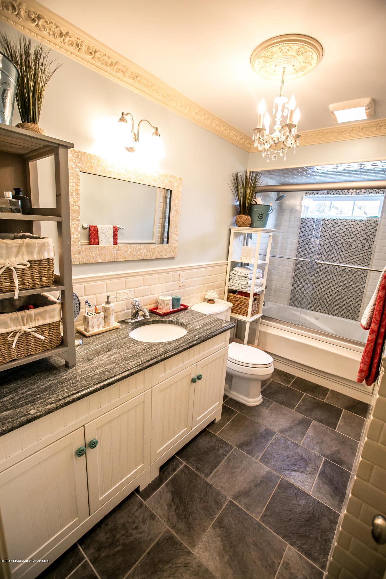 315 Edgemoor Road Middletown, NJ 07718 - Photo 12 of 28 a spacious bathroom with a double vanity sink a toilet and a mirror