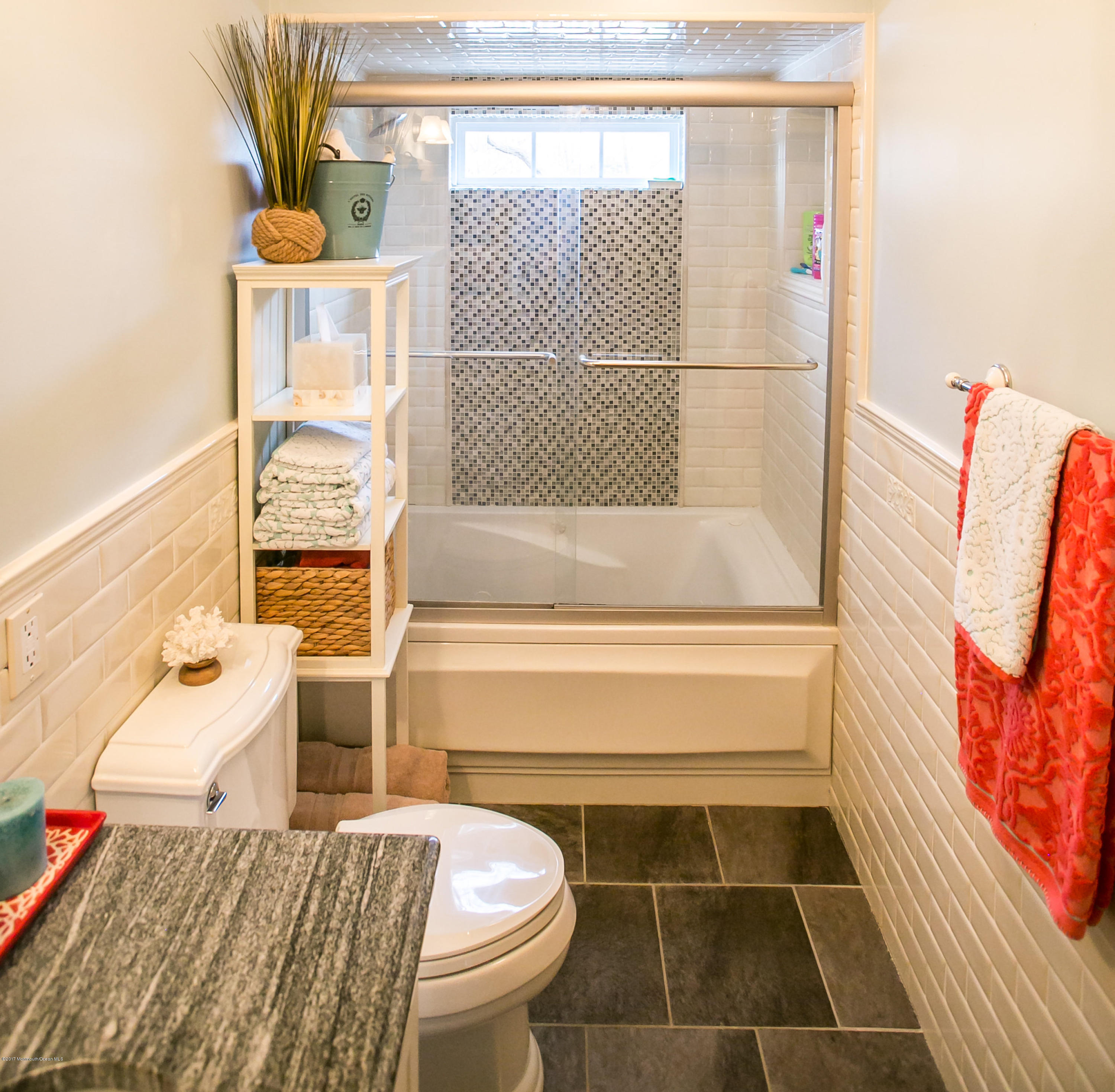 315 Edgemoor Road Middletown, NJ 07718 - Photo 13 of 28 a bathroom with a sink and a bathtub