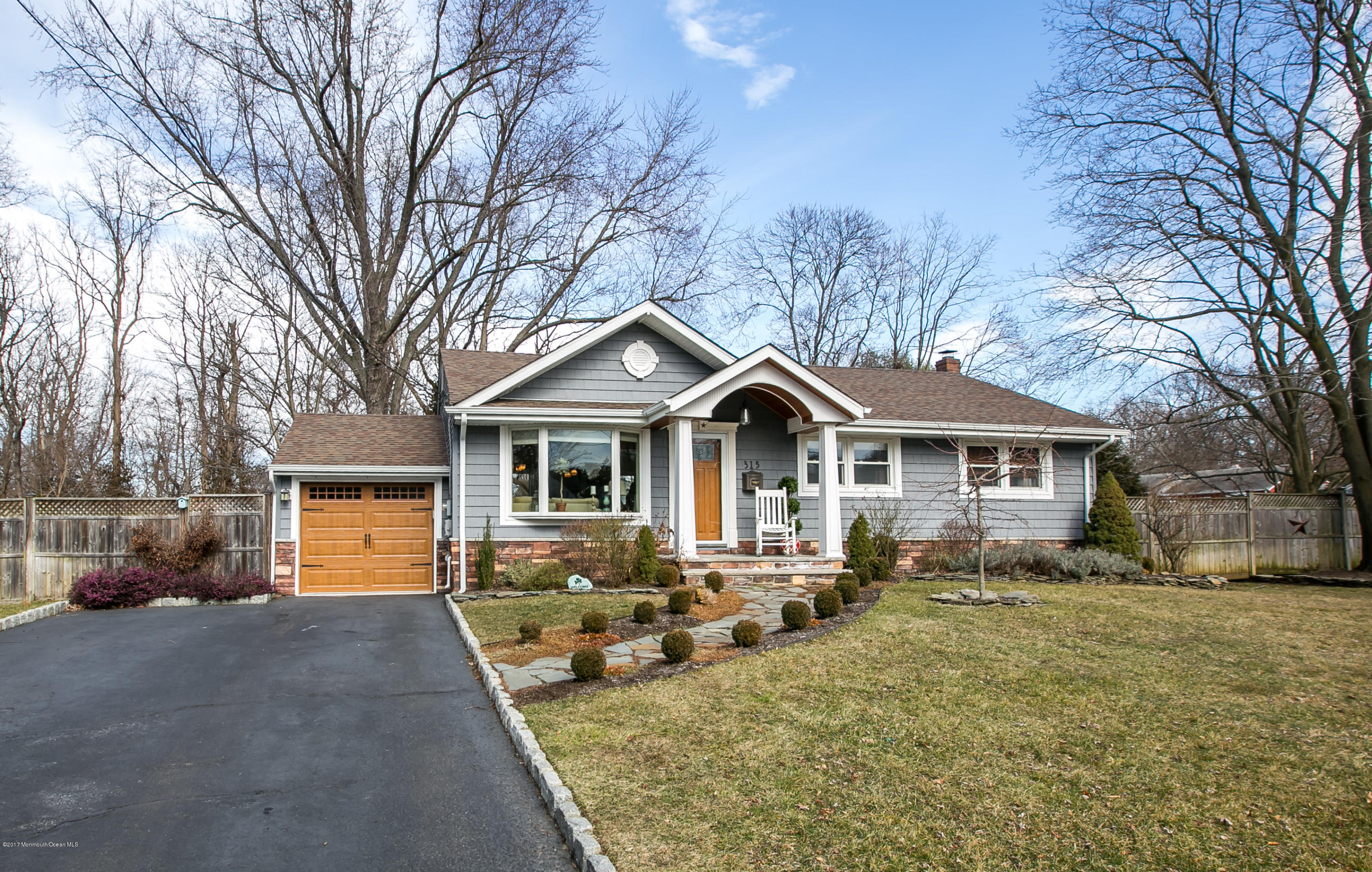 315 Edgemoor Road Middletown, NJ 07718 - Photo 2 of 28 a front view of a house with a yard