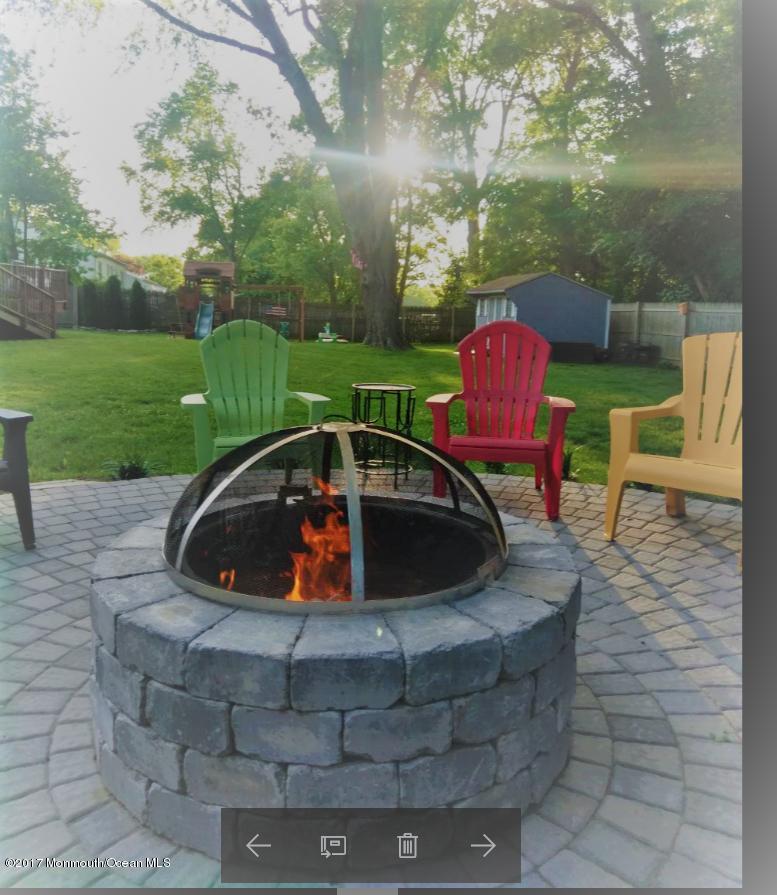 315 Edgemoor Road Middletown, NJ 07718 - Photo 24 of 28 a view of outdoor sitting area with golf course