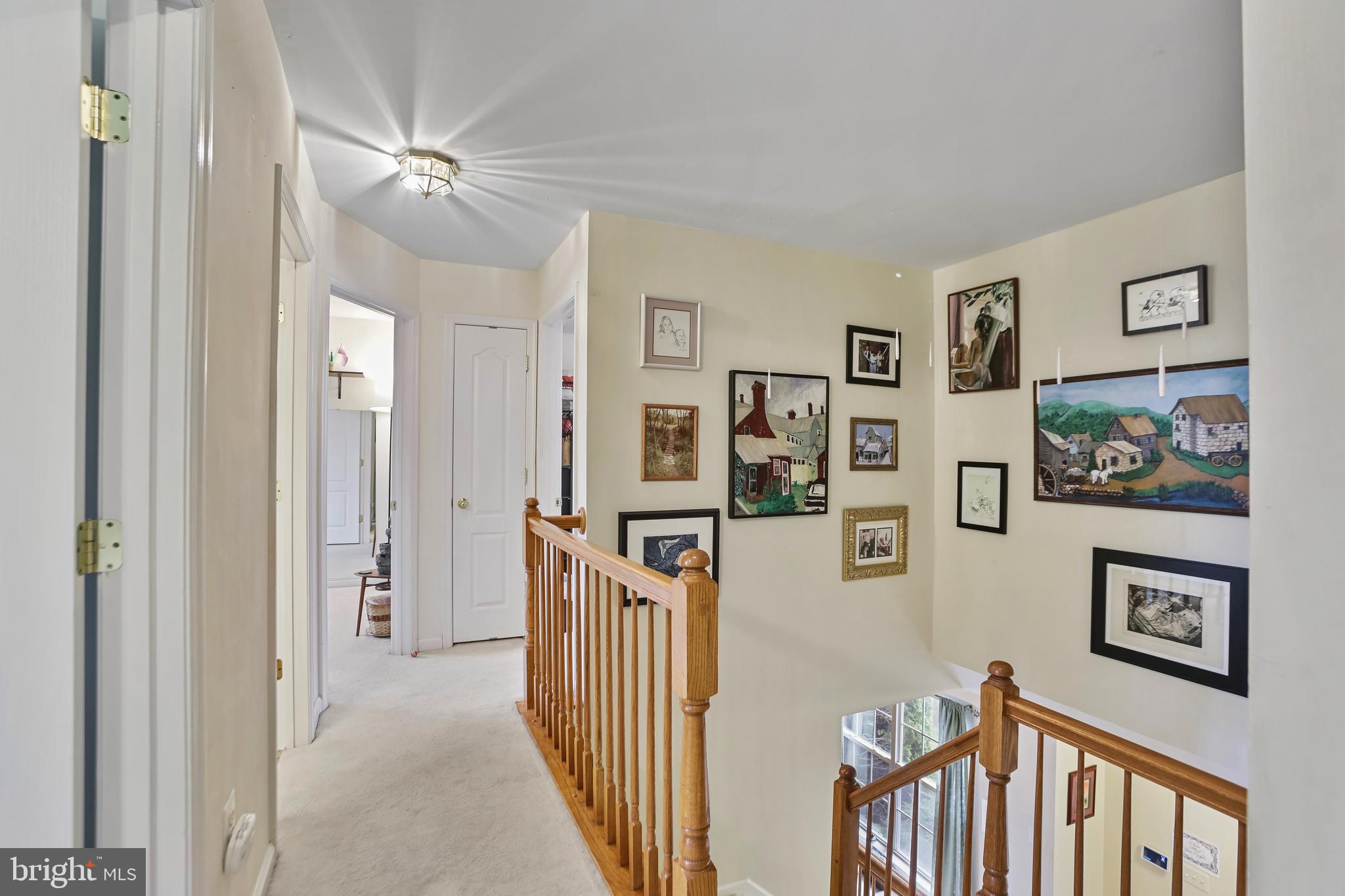 97 Webb Court Frederick, MD 21702 - Photo 14 of 34 a view of a hallway with a dining area