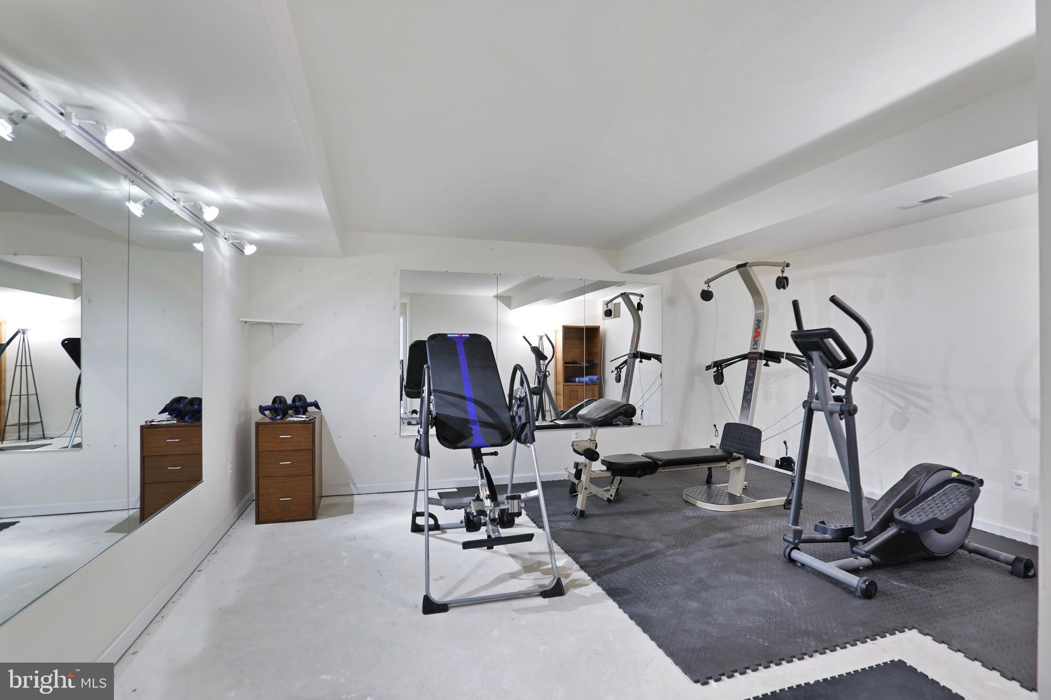 97 Webb Court Frederick, MD 21702 - Photo 20 of 34 a view of a room with gym equipment