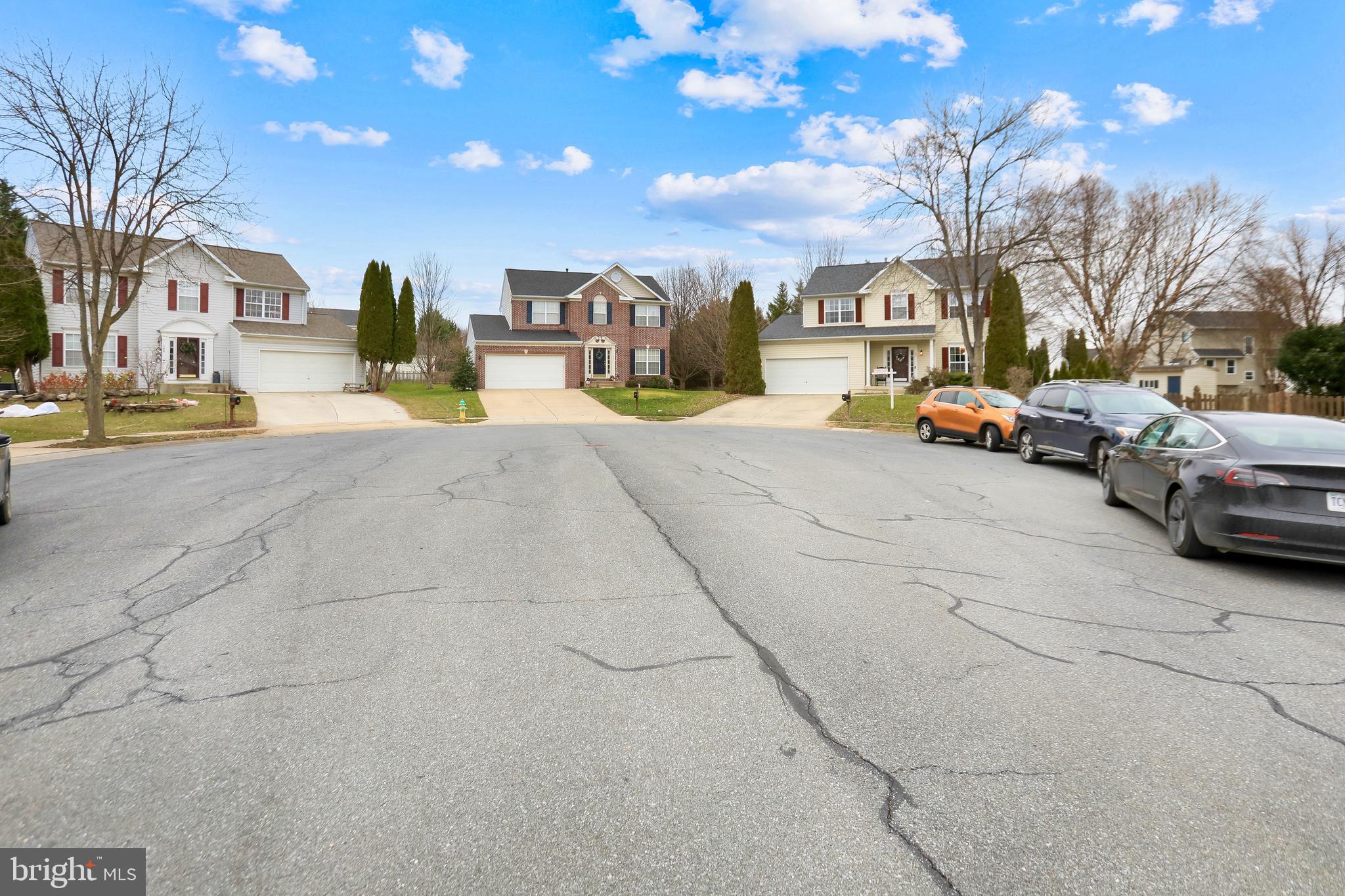 97 Webb Court Frederick, MD 21702 - Photo 3 of 34 a view of parking with cars parked in front of it