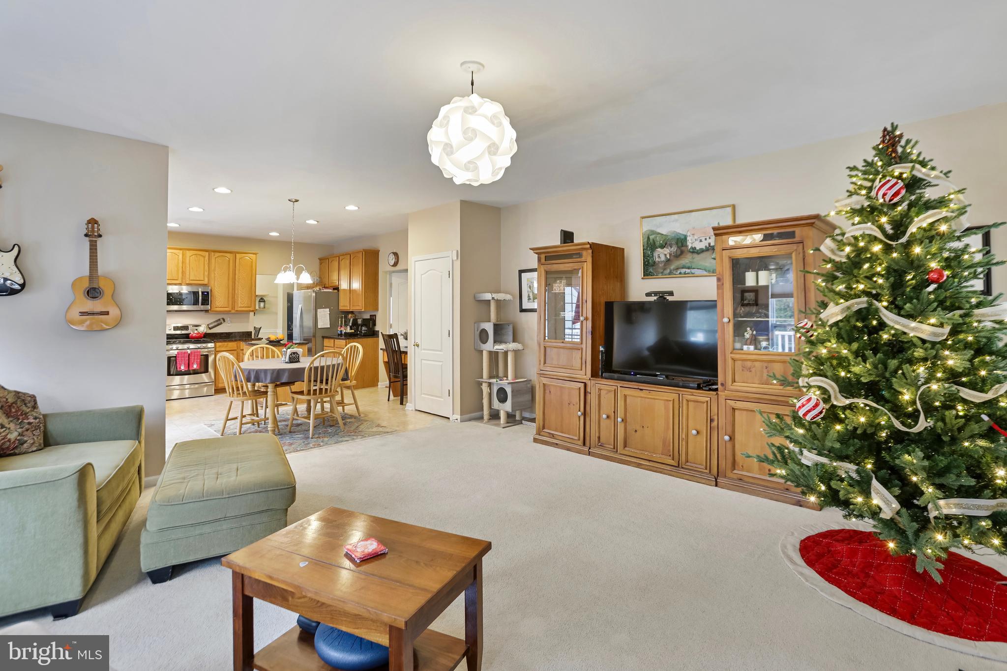 97 Webb Court Frederick, MD 21702 - Photo 5 of 34 a living room with furniture and a flat screen tv