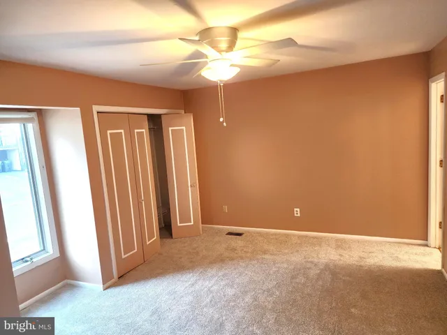a view of a room with a bathroom