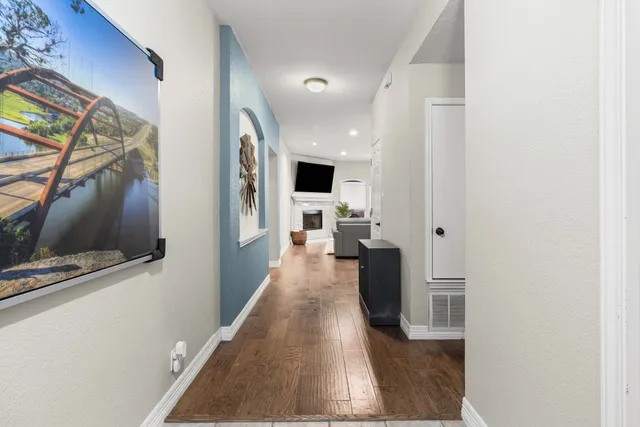 a view of a living room with a flat screen tv