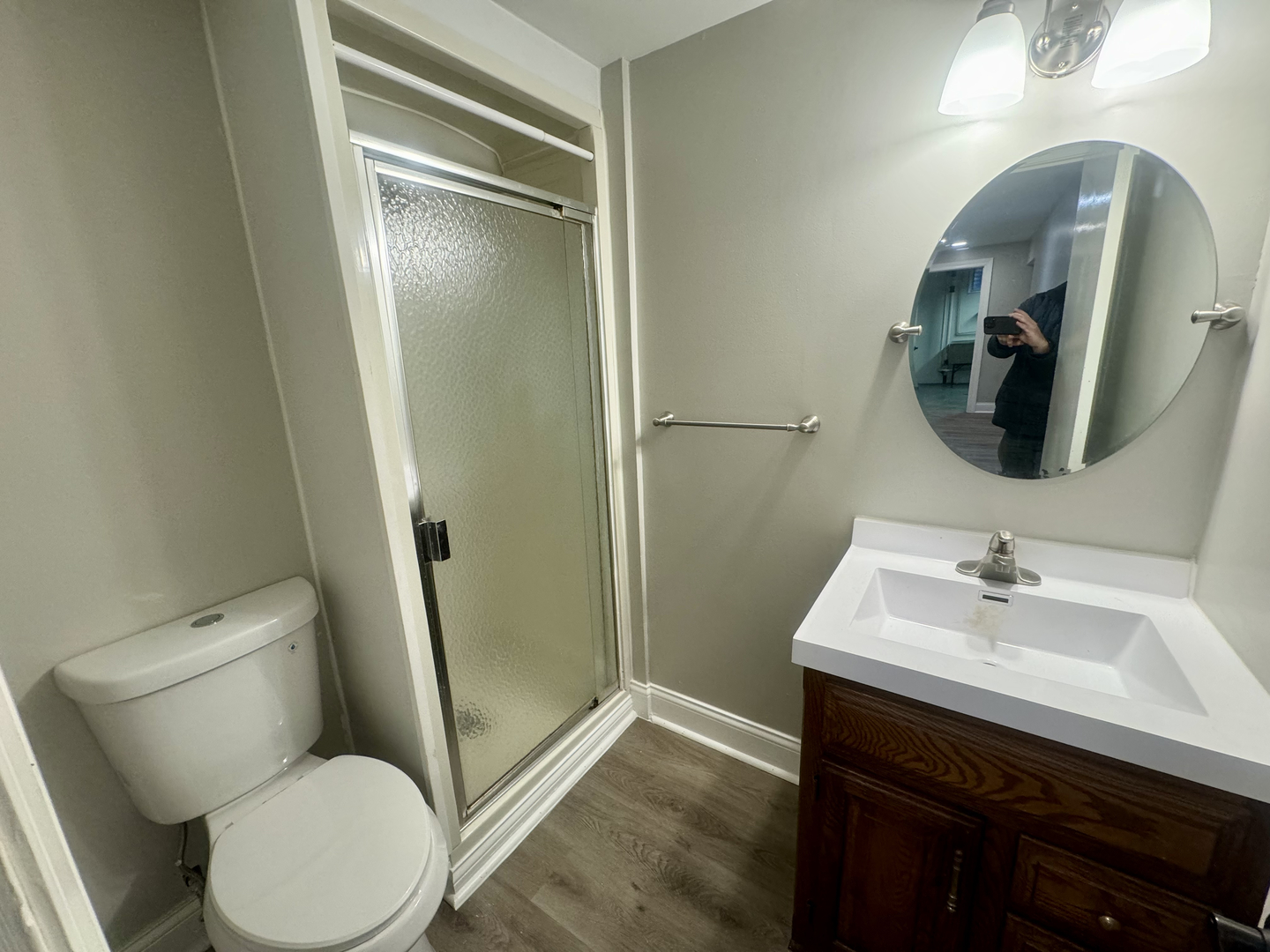 141 Warren Avenue Bloomingdale, IL 60108 - Photo 13 of 22 a bathroom with a toilet sink and mirror