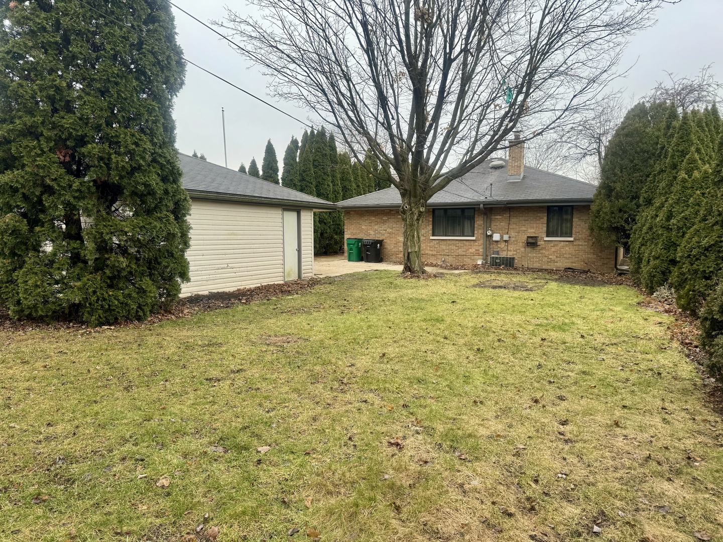 141 Warren Avenue Bloomingdale, IL 60108 - Photo 18 of 22 a front view of a house with yard