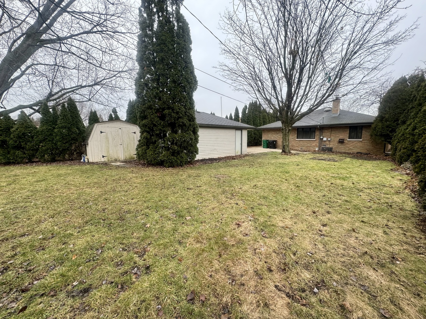 141 Warren Avenue Bloomingdale, IL 60108 - Photo 20 of 22 a view of a house with a yard
