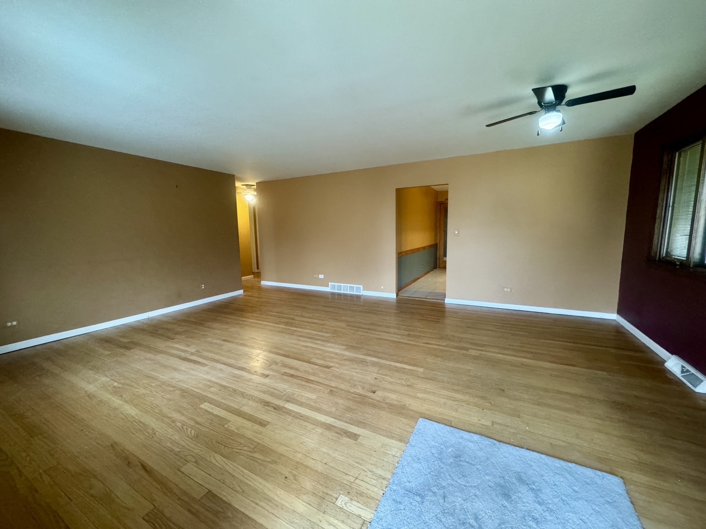 141 Warren Avenue Bloomingdale, IL 60108 - Photo 2 of 22 a view of empty room with wooden floor