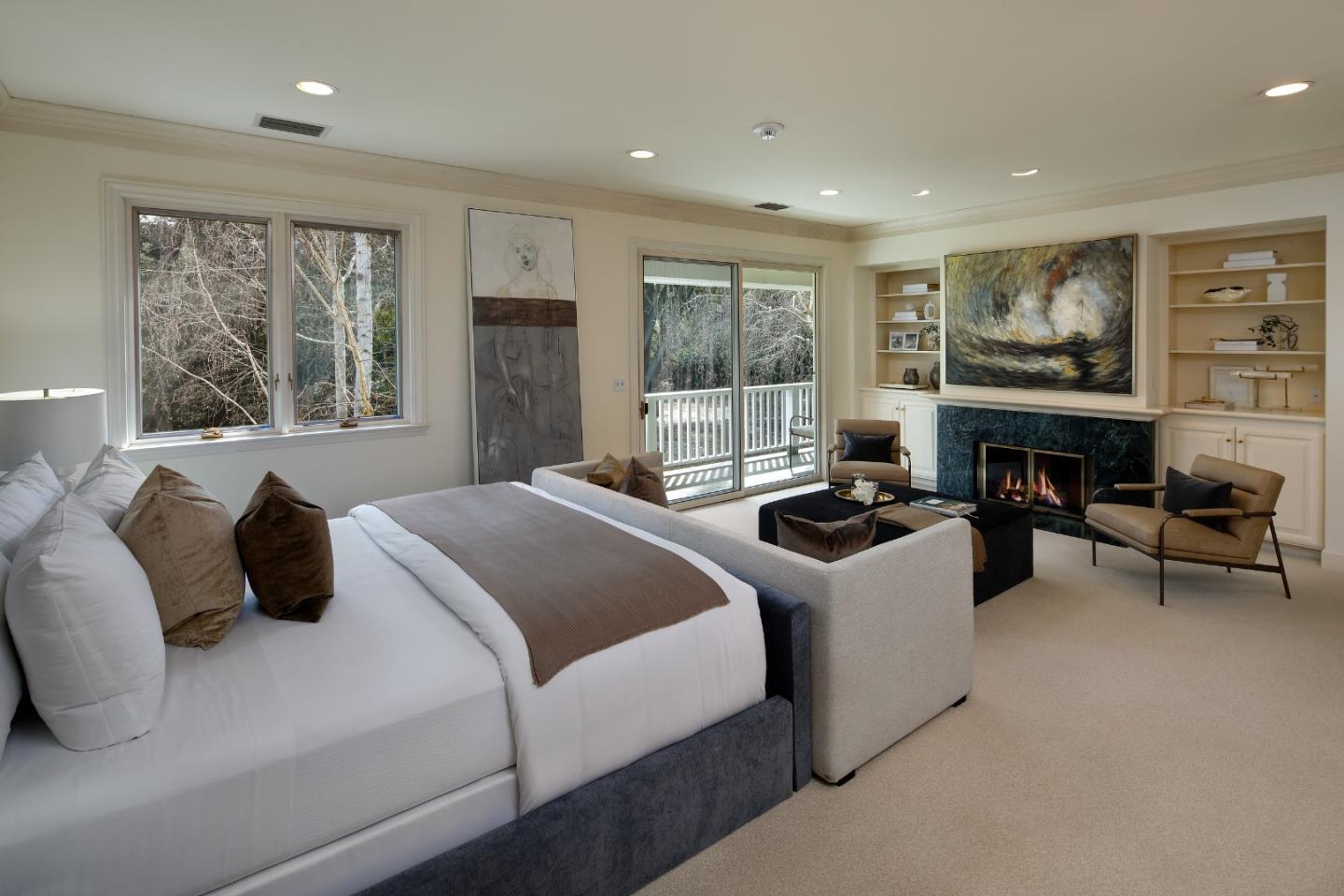 191 Britton Avenue Atherton, CA 94027 - Photo 15 of 23 a bedroom with furniture and a fireplace