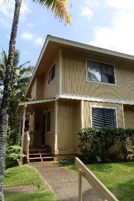 4800 Hanalei Plantation Road, Unit 5A Princeville, HI 96722 - Photo 11 of 20 a front view of a house with garden