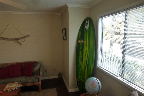 4800 Hanalei Plantation Road, Unit 5A Princeville, HI 96722 - Photo 16 of 20 a living room with furniture and a window
