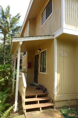4800 Hanalei Plantation Road, Unit 5A Princeville, HI 96722 - Photo 19 of 20 a front view of a house with a yard