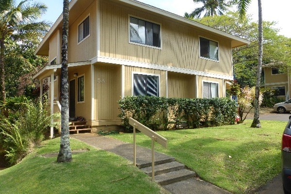 4800 Hanalei Plantation Road, Unit 5A Princeville, HI 96722 - Photo 20 of 20 a front view of a house with a yard