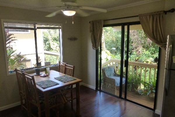 4800 Hanalei Plantation Road, Unit 5A Princeville, HI 96722 - Photo 2 of 20 a view of a dining room with furniture window and wooden floor