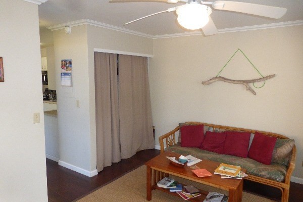4800 Hanalei Plantation Road, Unit 5A Princeville, HI 96722 - Photo 6 of 20 a living room with furniture and a table