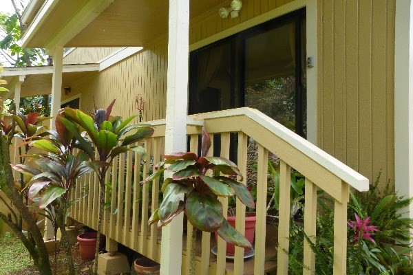 4800 Hanalei Plantation Road, Unit 5A Princeville, HI 96722 - Photo 10 of 20 a view of a house with a flower garden