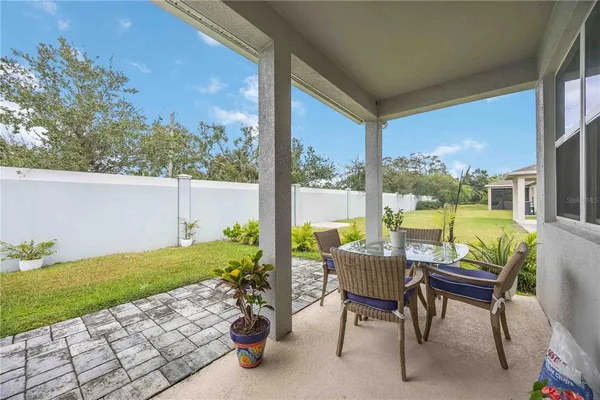 a backyard of a house with lots of green space