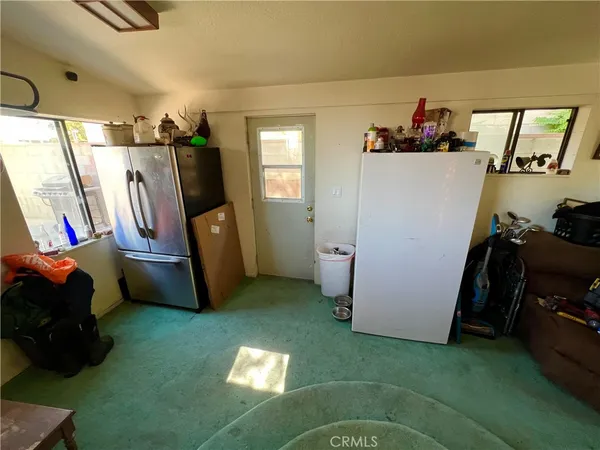 a utility room with closet dryer and washer