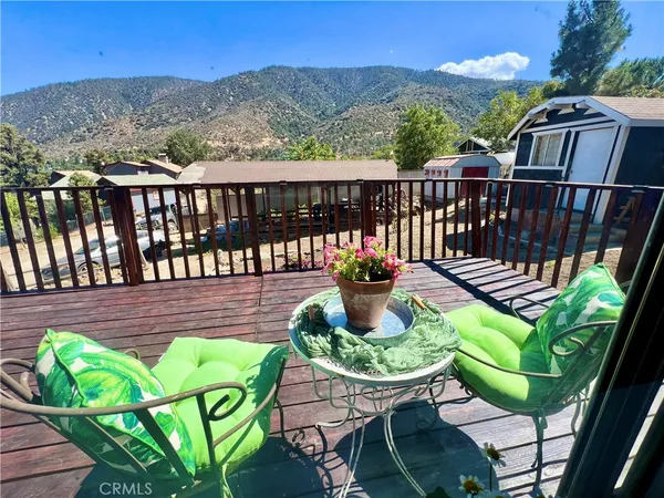 a view of a chair in wooden deck
