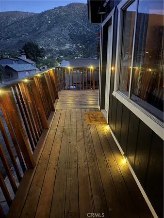 a view of balcony with furniture
