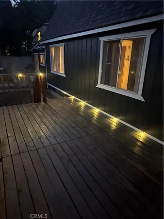 a view of balcony with furniture