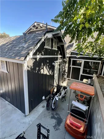 a view of a balcony with chairs