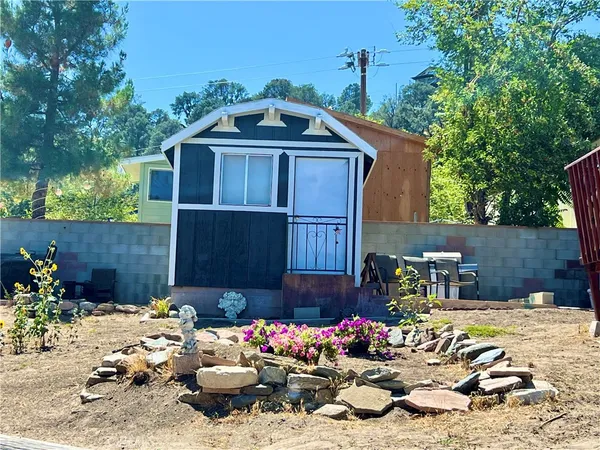 a front view of a house with patio